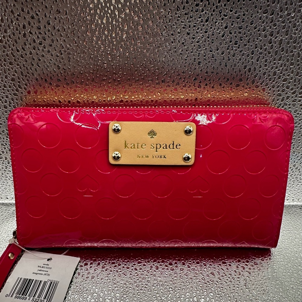 Gorgeous NWT hot pink Kate Spade wallet.